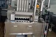 Maszyna-do-napełniania-i-zamykania-kubków-Ampack-Ammann-R-AA5 używany